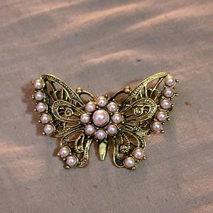 Gold Tone butterfly brooch with pink pearl beads